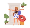 Happy woman leaving home for summer holiday travel. Excited young girl tourist standing near door with suitcases Royalty Free Stock Photo