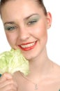 Happy woman with lettuce leaf. Royalty Free Stock Photo