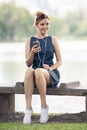 Happy woman listening music on line with headphones Royalty Free Stock Photo