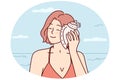 Happy woman listens to sound of sea putting shell to ear and closing eyes dreams. Vector image Royalty Free Stock Photo