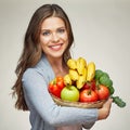 Happy woman with long hair and big toothy smile holding straw ba Royalty Free Stock Photo