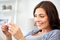 Happy woman looking at home pregnancy test Royalty Free Stock Photo