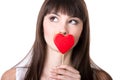 Happy woman in love holding heart shaped biscuit Royalty Free Stock Photo