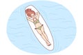 Happy woman lying on board in sea