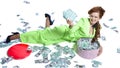 Happy woman lying with money in a box Royalty Free Stock Photo