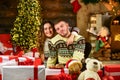 Happy woman and man. Celebrate new year at home. Winter shopping sales. Holiday mood. Couple in love. Christmas time Royalty Free Stock Photo