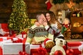 Happy woman and man. Celebrate new year at home. Winter shopping sales. Holiday mood. Couple in love. Loving hearts Royalty Free Stock Photo