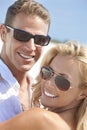 Happy Woman Man Couple In Sunglasses At Beach Royalty Free Stock Photo