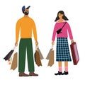 Happy woman and man standing together and holding bags with purchases. Cute couple or family is shopping. Royalty Free Stock Photo