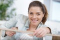 happy woman measure wood plank before saw Royalty Free Stock Photo