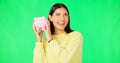 Happy woman, money and savings on green screen for investment, budget or finance against studio background. Portrait of Royalty Free Stock Photo