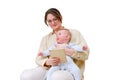 Happy woman mother with infant baby watching in digital tablet while Royalty Free Stock Photo