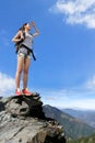 Happy woman mountain hiker