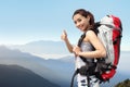 Happy woman mountain hiker