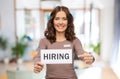 happy woman or office worker with hiring banner
