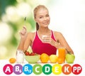 Happy woman with organic food and vitamins Royalty Free Stock Photo