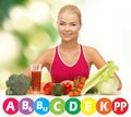 Happy woman with organic food and vitamins Royalty Free Stock Photo