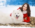 Happy woman owner having fun with white Samoyed dog outdoors Royalty Free Stock Photo