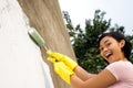 Happy woman painting