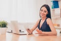 Happy woman painting nails instead of working in office Royalty Free Stock Photo