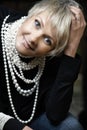 Happy woman with pearls Royalty Free Stock Photo