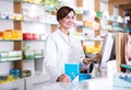 Pharmacist ready to assist in choosing at counter