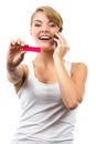 Happy woman with phone informing someone about positive pregnancy test Royalty Free Stock Photo