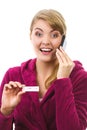 Happy woman with phone informing someone about positive pregnancy test Royalty Free Stock Photo