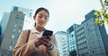 Happy woman, phone and walking in city for communication, social media or outdoor networking. Young female person smile Royalty Free Stock Photo