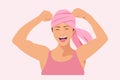 Happy woman in pink headwear showing muscles beating cancer. Vector image Royalty Free Stock Photo