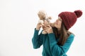 Happy woman plays with a teddy bear isolated on white Royalty Free Stock Photo