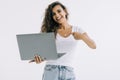 Happy woman pointing at a laptop screen isolated over white Royalty Free Stock Photo