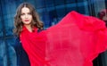 Happy woman. Portrait of the beautiful girl. Happy woman with a scarf. Portrait of the beautiful girl. Office building. Royalty Free Stock Photo