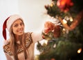 Happy woman, portrait and Christmas tree with decor for festive spirit, December holiday or season at home. Face of Royalty Free Stock Photo