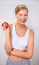 Happy woman, portrait and diet with apple for nutrition in fitness, health and wellness at home. Face of female person Royalty Free Stock Photo