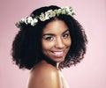 Happy woman, portrait and flower crown for beauty in studio, pink background and natural skincare. Face of african model