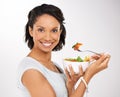 Happy woman, portrait and fruit bowl for diet, salad or natural nutrition against a studio background. Female person or Royalty Free Stock Photo