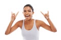 Happy woman, portrait and rock hands in fitness, health and wellness against a white studio background. Face of excited
