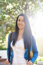 Happy woman, portrait and student with bag on campus for back to school, learning or education. Young female person or Royalty Free Stock Photo