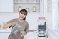 Happy woman pouring fresh water into the glass Royalty Free Stock Photo