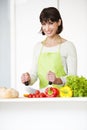 Happy Woman Preparing Meal