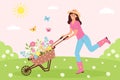 Happy woman pushing garden cart with flowers on the meadow.