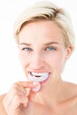 Happy woman putting her gum shield Royalty Free Stock Photo