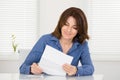 Happy Woman Reading Letter Royalty Free Stock Photo