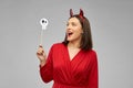 Happy woman in red halloween costume of devil Royalty Free Stock Photo