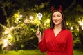 Happy woman in red halloween costume of devil Royalty Free Stock Photo