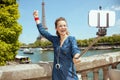 Happy woman rejoicing and taking selfie using selfie stick Royalty Free Stock Photo