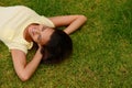 Happy woman relax on park grass, garden and nature, freedom or rest on summer lawn with mockup. Above of young girl Royalty Free Stock Photo