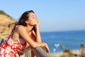 Happy woman relaxing with eyes closed on the beach Royalty Free Stock Photo