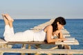 Happy woman relaxing reading Royalty Free Stock Photo